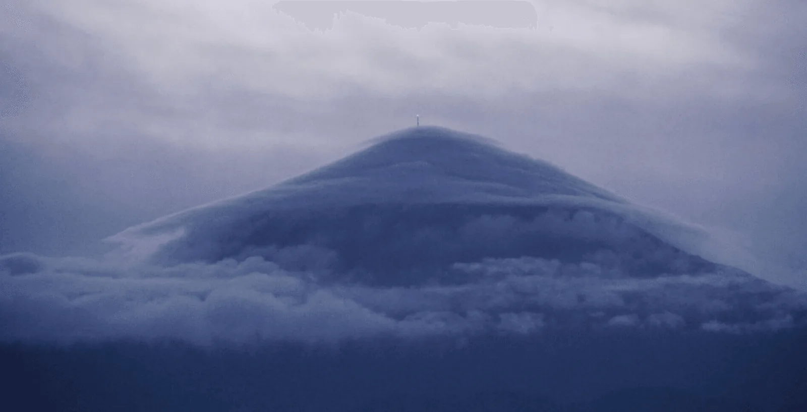 Lenticular Clouds and Antenna on Mt. Karisimbi — Muyombano Célestin
